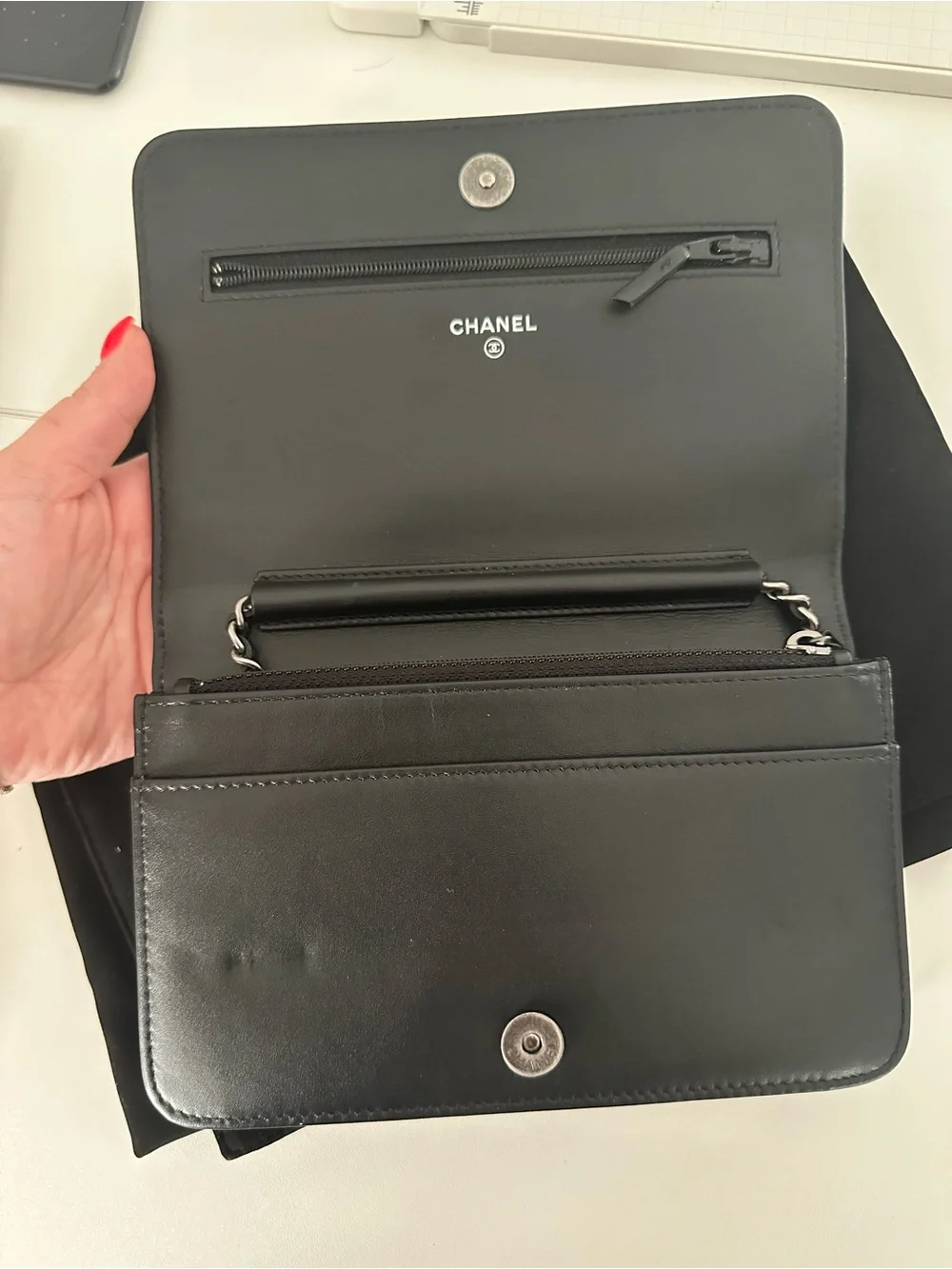 CHANEL Black Leather Clutch with Mixed Metal Chain Script